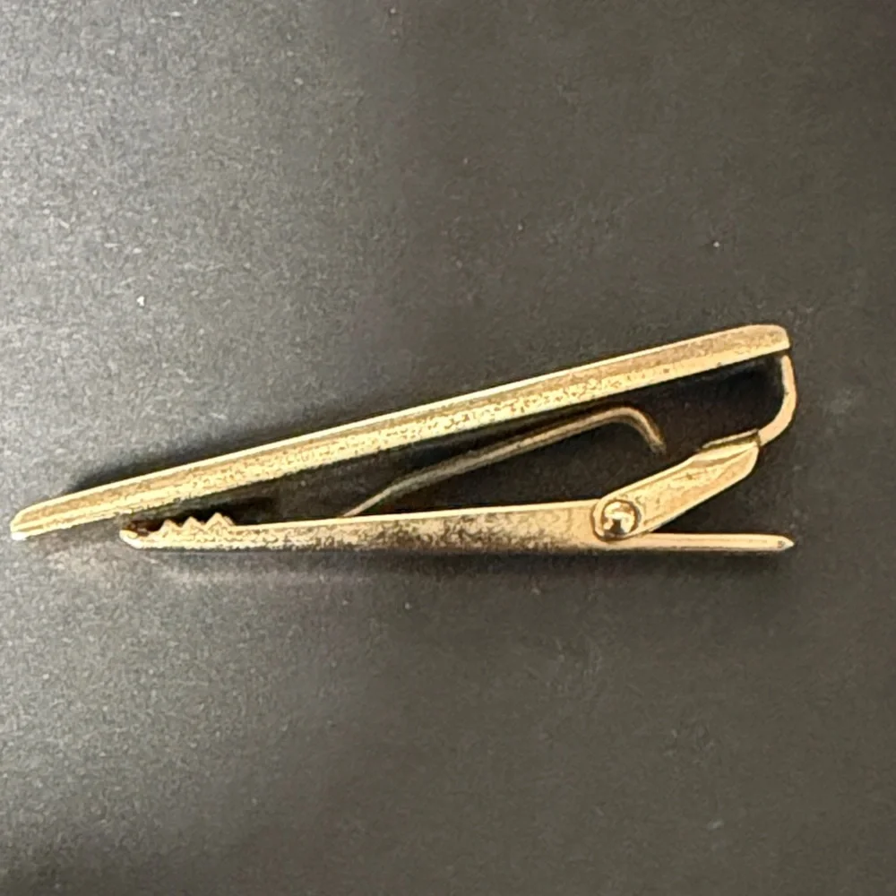 Authentic YSL / Yves Saint Laurent Black and Gold Tie Clip